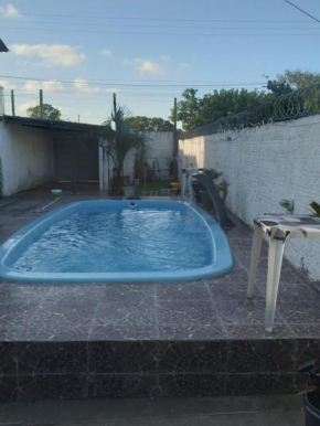 Casa com piscina pelo airb